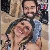 Custom paint by numbers painting of two adults smiling together outdoors, with its source photograph