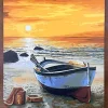 Completed custom painting of two adults smiling together outdoors displayed on a tabletop at home