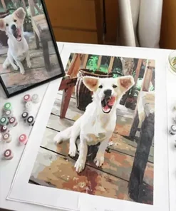 Custom paint by numbers painting of a dog with clearly visible eyes and distinct coat markings, with its source photograph