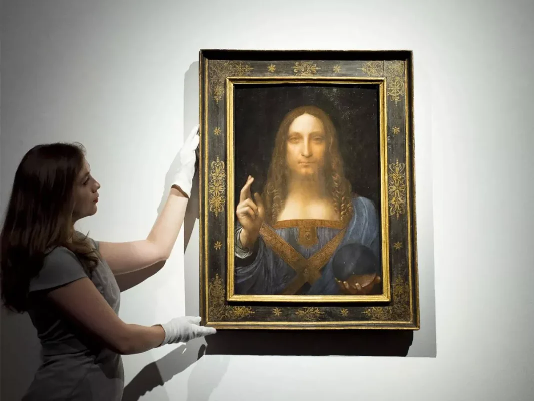 Salvator Mundi painting by Leonardo da Vinci showing Christ holding a crystal orb
