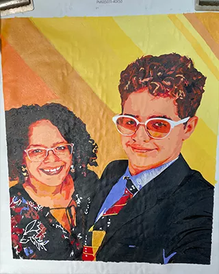 A joyful portrait turned into a meaningful piece of handcrafted wall art