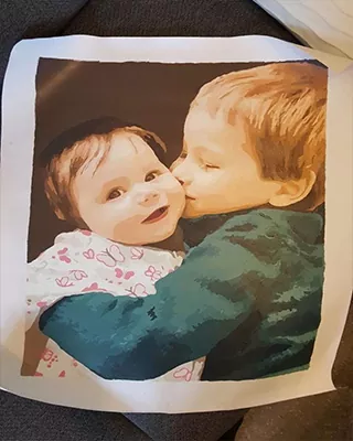 A loving sibling hug captured in a custom paint by numbers portrait