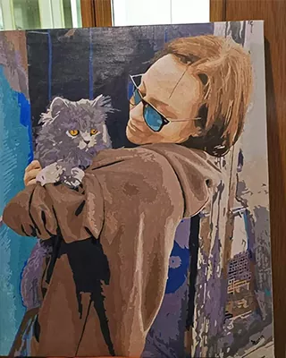 A memorable moment with a beloved cat reimagined as personalized canvas art