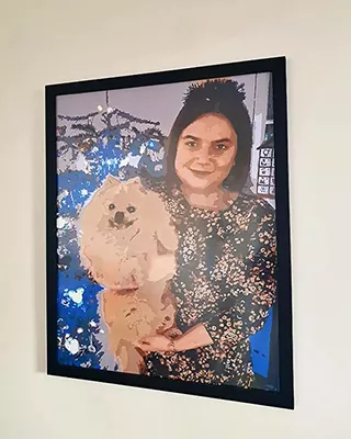 A proud pet owner immortalized alongside her beloved companion