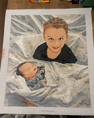 A touching family milestone brought to life with paint by numbers