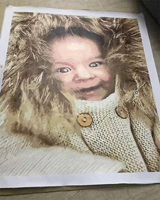 Custom artwork capturing the warmth and joy of a baby's first memories