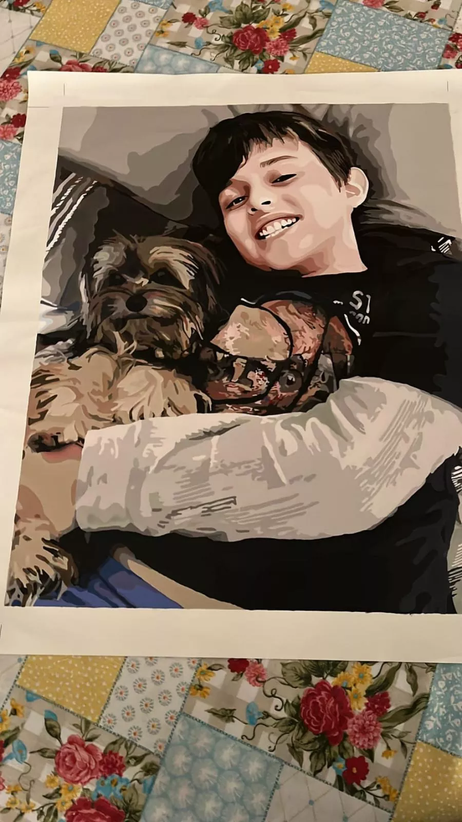Custom paint by numbers of a smiling child cuddling two beloved dogs