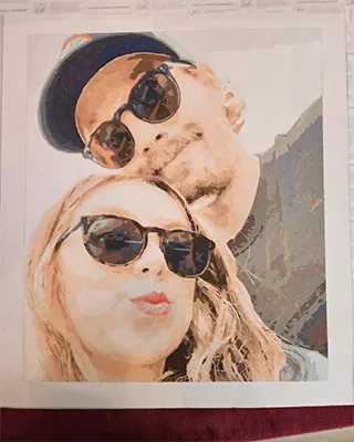 Custom paint by numbers portrait of a smiling couple wearing sunglasses recreated from a favorite photo