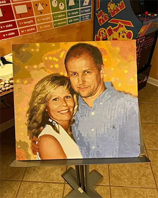 Custom paint by numbers portrait of a smiling couple