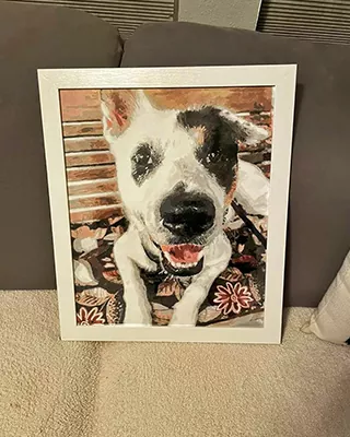 Framed custom pet paint by numbers of a happy black and white dog