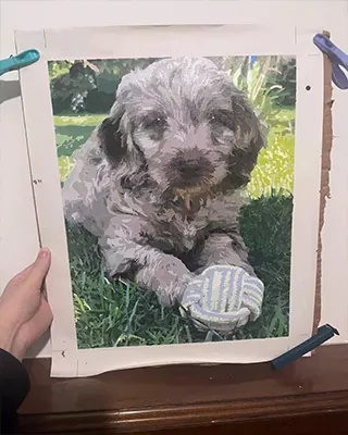 Playful puppy captured in a custom canvas inspired by a favorite photo