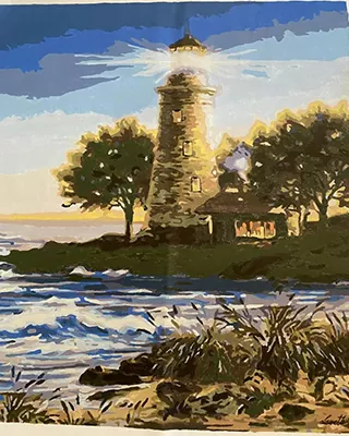 Coastal lighthouse glowing above ocean waves in a personalized paint by numbers landscape