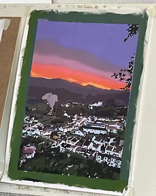 Colorful sunset overlooking a town and mountains in a custom paint by numbers landscape