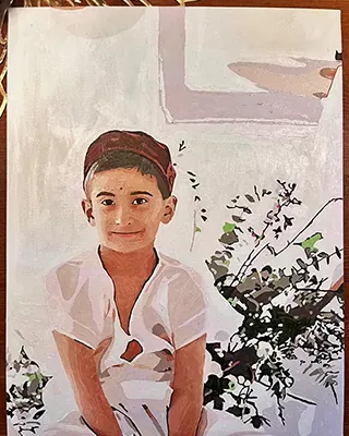 Custom child portrait of a smiling boy in a white shirt