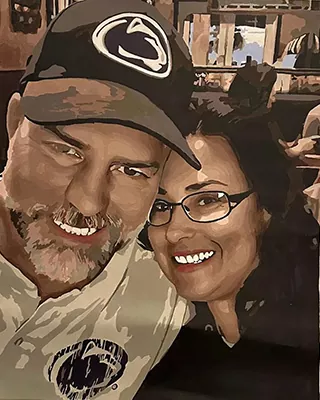 Custom couple portrait of a smiling couple taking a close up selfie