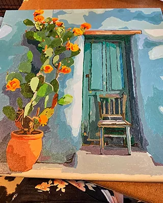 Custom paint by numbers landscape featuring a rustic blue door with climbing orange flowers