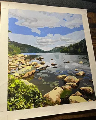 Custom paint by numbers landscape of a peaceful lake surrounded by rocky shores and forested hills