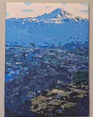 Custom paint by numbers landscape of a snow capped mountain above a blue valley