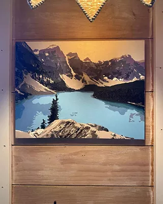 Custom paint by numbers landscape of a turquoise mountain lake surrounded by snowy peaks