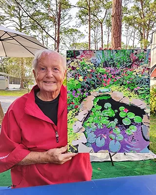 Custom paint by numbers of a blooming water lily pond proudly displayed by its artist