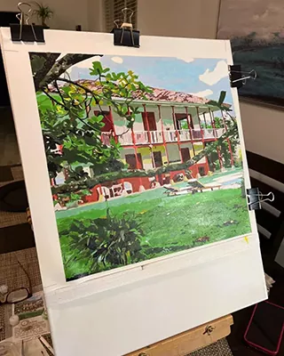 Custom paint by numbers of a tropical home surrounded by lush greenery