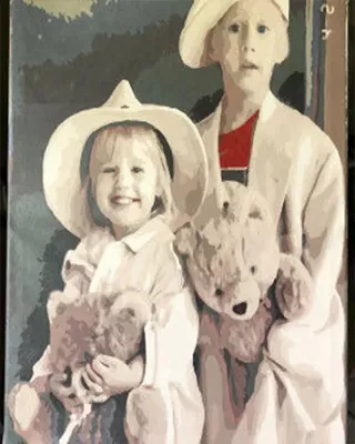 Custom paint by numbers of two children in cowboy hats holding stuffed animals
