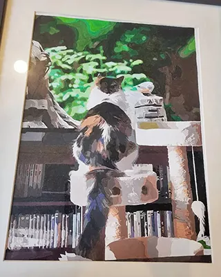 Custom paint by numbers portrait of a calico cat relaxing on a cat tree by the window