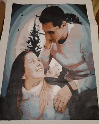 Custom paint by numbers portrait of a couple sharing a loving moment