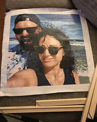 Custom paint by numbers portrait of a couple wearing sunglasses at the beach
