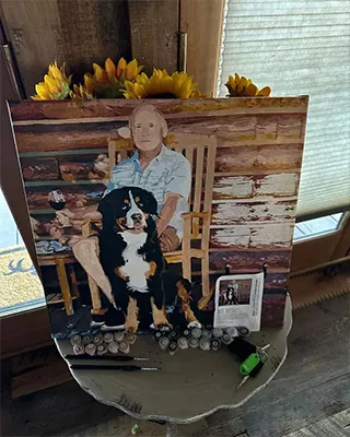 Custom paint by numbers portrait of a man sitting with his large dog