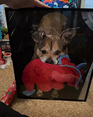 Custom paint by numbers portrait of a small brown dog holding a bright red plush toy
