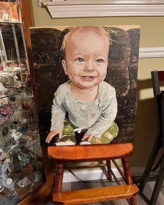 Custom paint by numbers portrait of a smiling baby with a cheerful expression