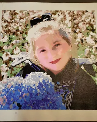 Custom paint by numbers portrait of a smiling child holding blue hydrangea flowers.