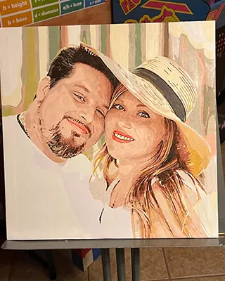 Custom paint by numbers portrait of a smiling couple posing together