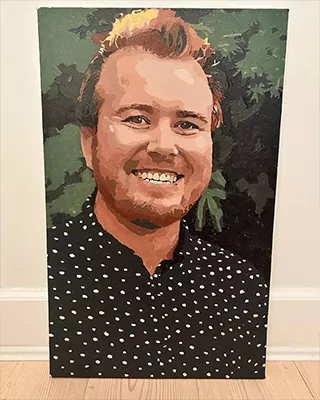 Custom paint by numbers portrait of a smiling man in a black polka dot shirt
