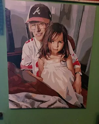 Custom paint by numbers portrait of an older sibling holding a young girl