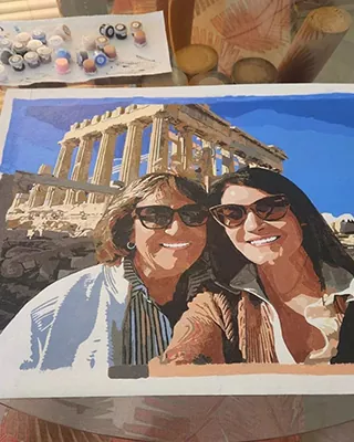 Custom paint by numbers portrait of two women posing together at the Acropolis in Athens