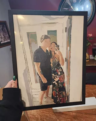Framed custom paint by numbers portrait of a couple sharing a sweet mirror selfie
