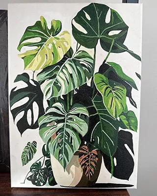 Lush botanical paint by numbers showcasing layered monstera leaves in rich shades of green