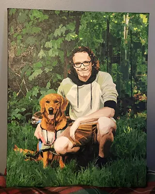 Man posing with his happy dog in a personalized paint by numbers portrait