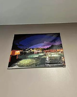 Nighttime waterfront scene with glowing lights in a custom paint by numbers landscape