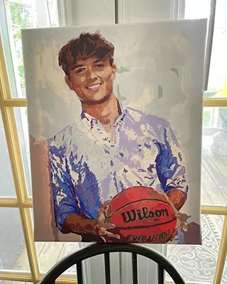 Personalized paint by numbers portrait of a smiling young basketball player