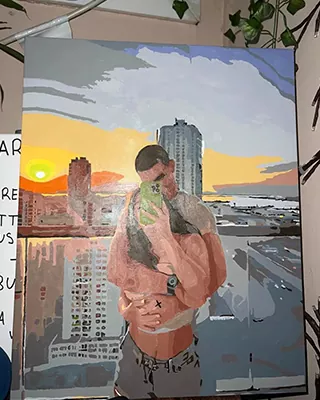 custom diamond painting couple portrait embracing at sunset with a city skyline