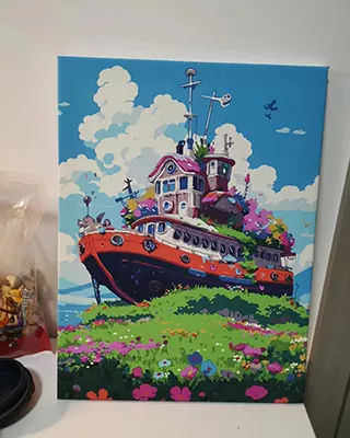 paint by numbers of a colorful houseboat resting among wildflowers beneath a bright blue, cloud-filled sky